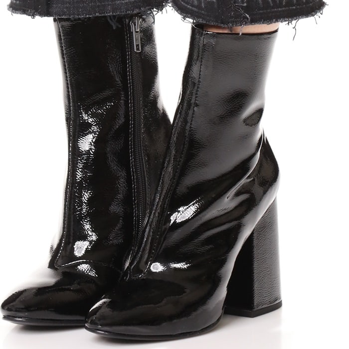 Block-heeled leather ankle boots in a glossy patent finish add slick polish to your everyday ensemble