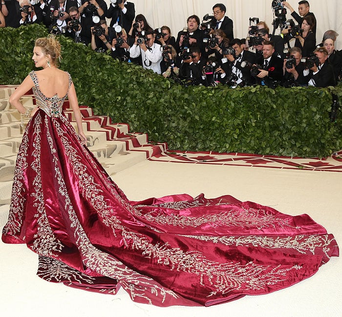 Back view of Blake Lively's Atelier Versace Meta Gala gown with an embroidered train.