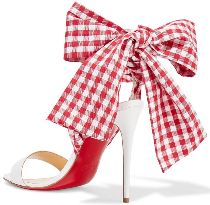 These sandals are topped with gingham canvas ties that wind around your ankle and tie into a pretty bow