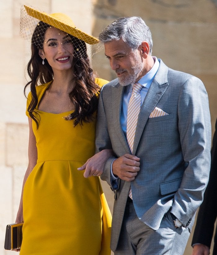 George Clooney, wearing a sharp two-piece Armani suit, exuded confidence and sophistication