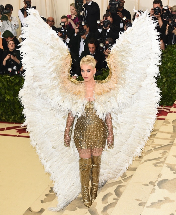 Katy Perry wearing a gold sequin-embellished chainmail-inspired mini dress