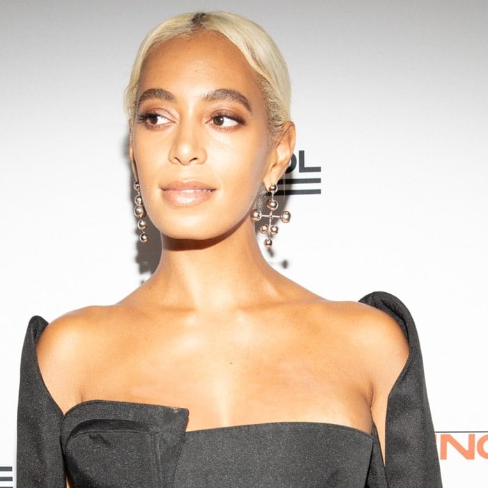 Solange Knowles showing off her silver earrings at the 2018 Parsons Benefit