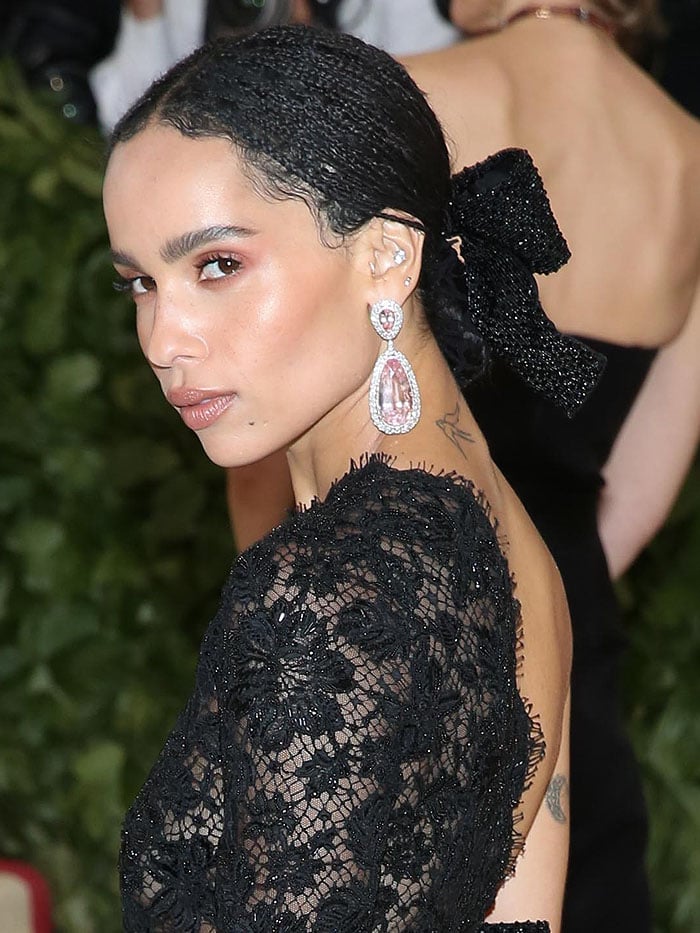 Zoë Kravitz wearing dazzling Jacob Co. pink-diamond drop earrings.