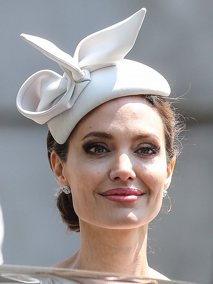 Angelina Jolie in an elegant Ralph Russo Couture fascinator hat