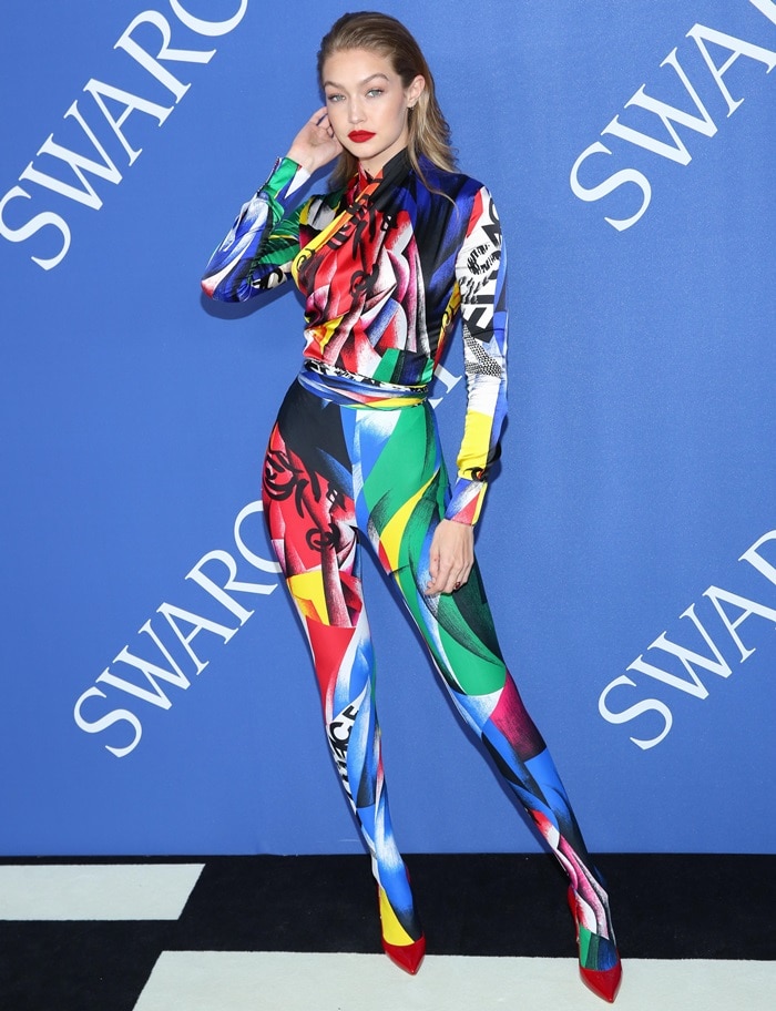 Gigi Hadid in a multicolored graphic brushstroke print Versace Fall 2018 jumpsuit