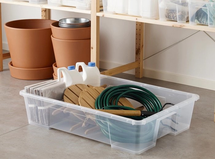 IKEA’s SAMLA box delivers a clean, low-profile storage solution, with its highly transparent design making it easy to spot contents at a glance while sliding neatly under the bed to maximize unused space