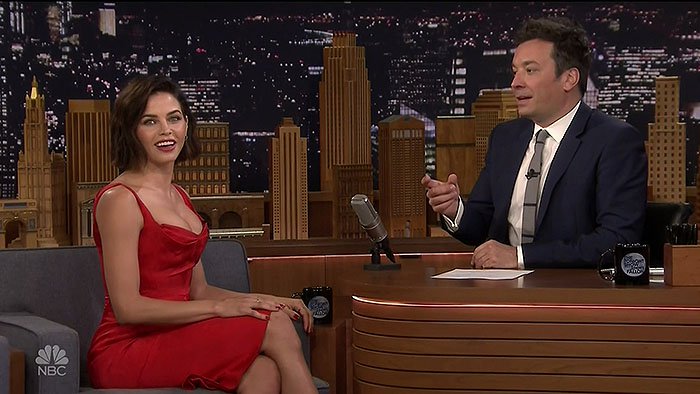 Jenna Dewan wearing a Zac Posen red satin dress with Jennifer Meyer jewelry during her guest appearance on "The Tonight Show Starring Jimmy Fallon"