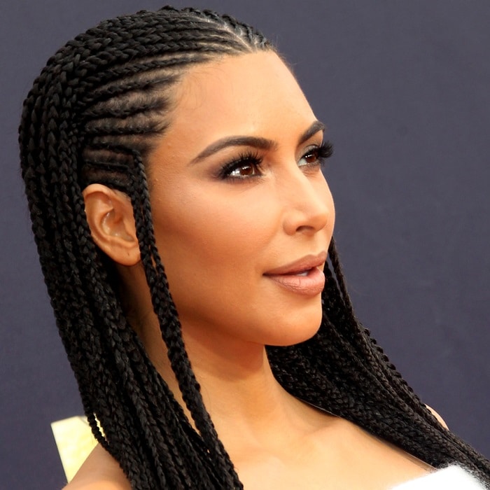 Kim Kardashian with her hair in neat braids at the 2018 MTV Movie TV Awards at Barker Hangar in Santa Monica, California, on June 16, 2018