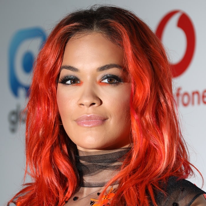 Rita Ora's dyed red locks at the 2018 Capital FM SummerTime Ball at Wembley Stadium in London, England, on June 9, 2018