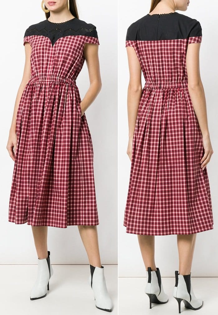 This red and black cotton plaid flared midi dress is a staple piece and features a round neck, short sleeves, a plaid print, a fitted waist, a mid-length and a flared style