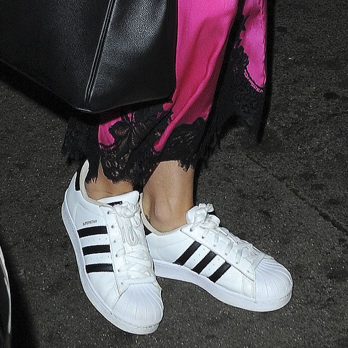 Closeup of Katy Perry's Adidas Originals "Superstar" sneakers.