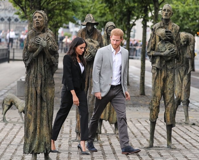 Meghan Markle and Prince Harry visiting the Famine Memorial in Dublin