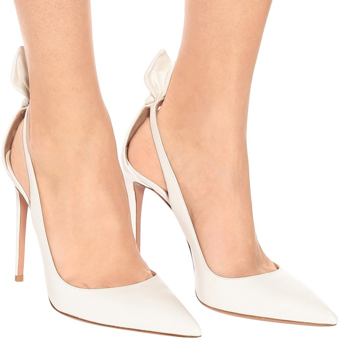 Crafted in Italy from leather, the style has a pointed toe, cutouts at the sides, and a knotted detail at the heel
