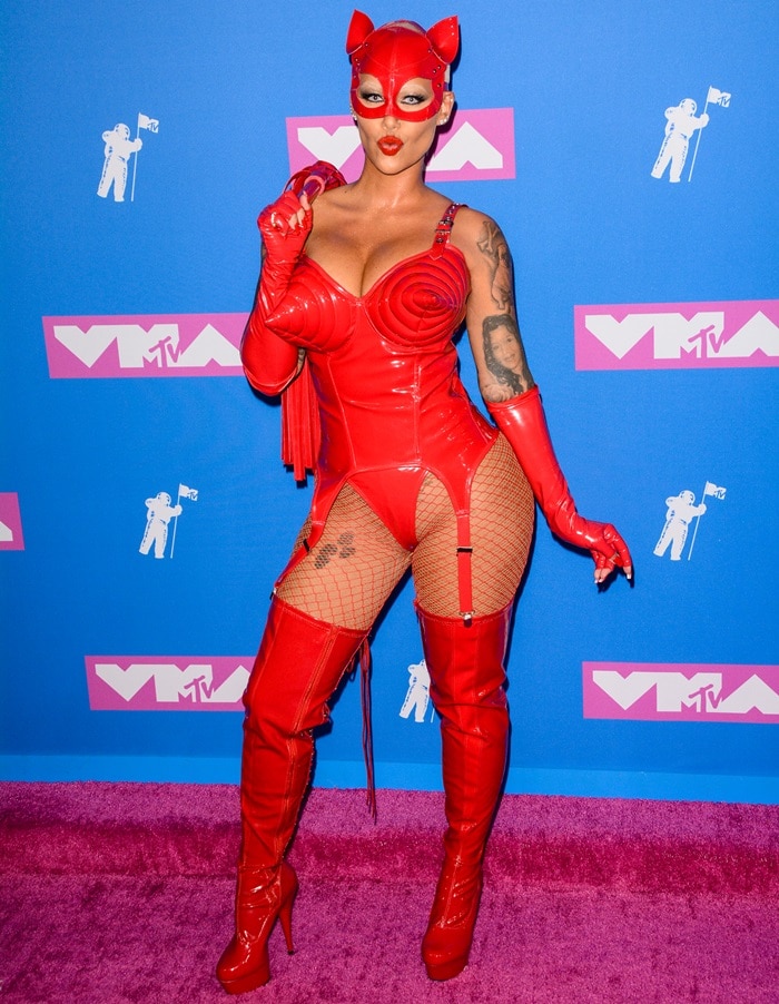 Amber Rose took it to the next level in a latex corset complete with a matching leather whip