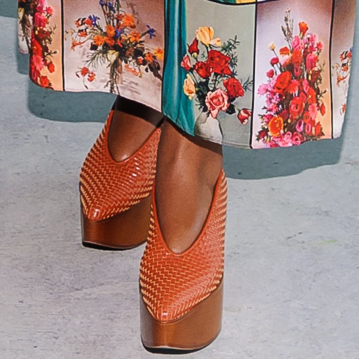 Gabrielle Union wearing rust-colored platform clogs
