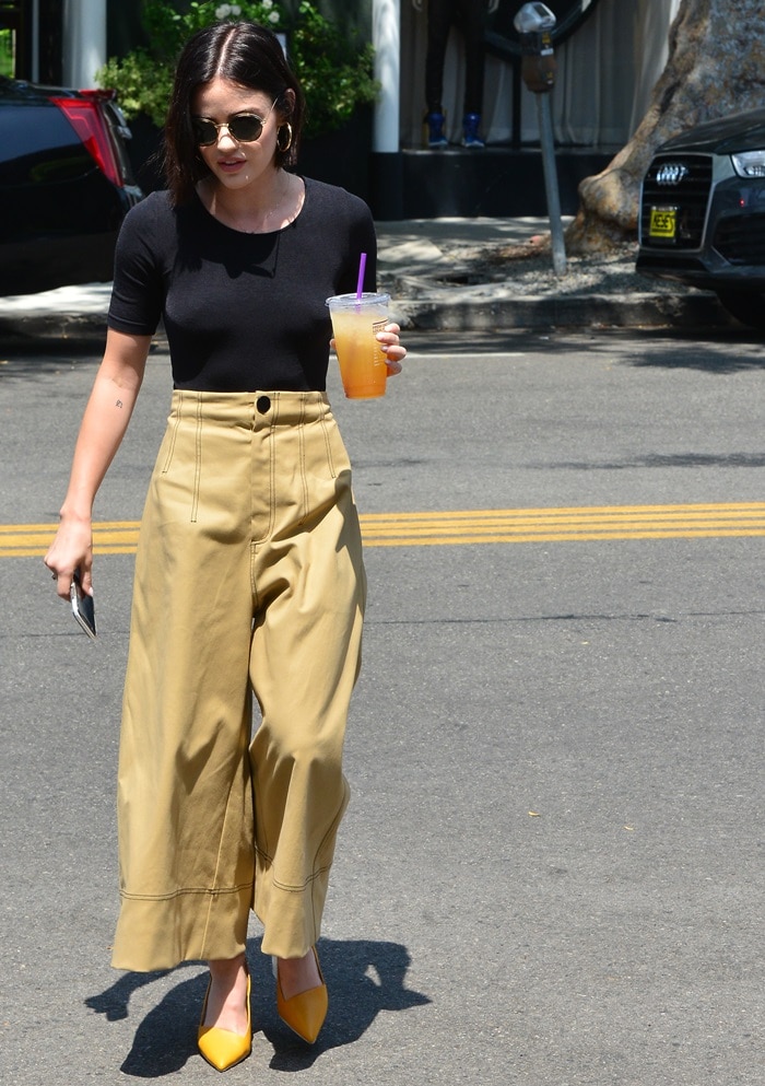 Lucy Hale rocking ginger-colored Mercedes Castillo 'Noni' high slingback pumps