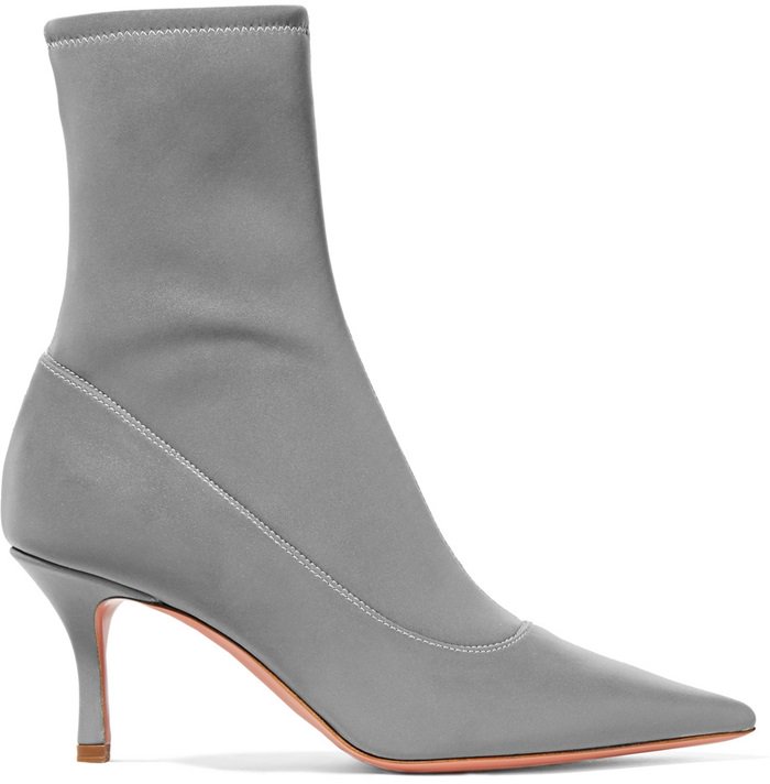 These sleek boots are set on a 70mm stiletto heel and made from reflective stretch-knit fabric that catches the light at every angle