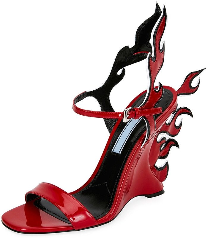 Prada Flame Patent Leather Wedge Sandals in glossy red patent leather with sculptural flame cutouts and a dramatic curved wedge heel, originally retailing for $1,100 and revived as part of Prada’s Fall 2018 return to its iconic flame motif design