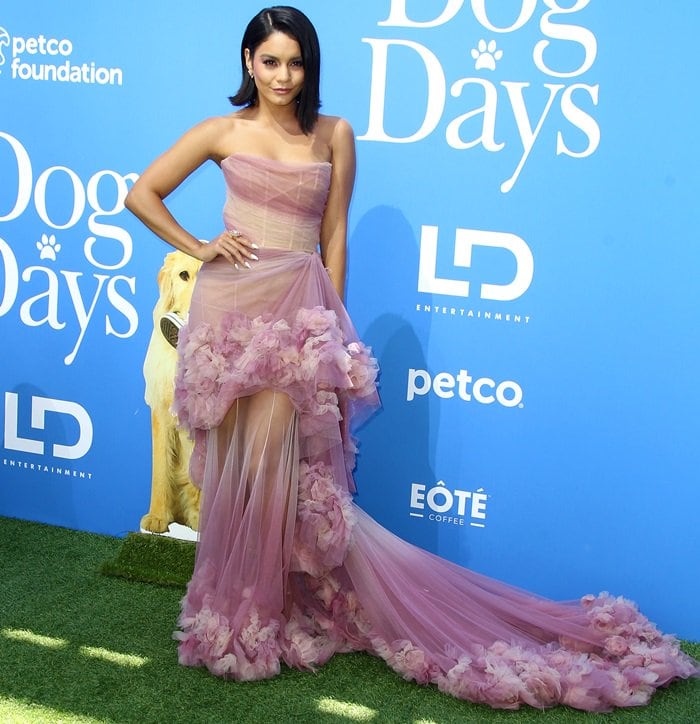 Vanessa Hudgens in a rose-colored Marchesa Spring 2018 gown featuring a strapless neckline and draped tulle and silk organza floral texture