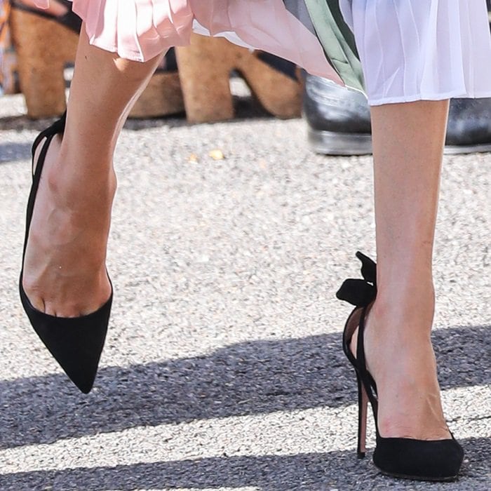 Duchess Meghan Markle shows toe cleavage in her go-to Aquazzura 'Deneuve' pumps
