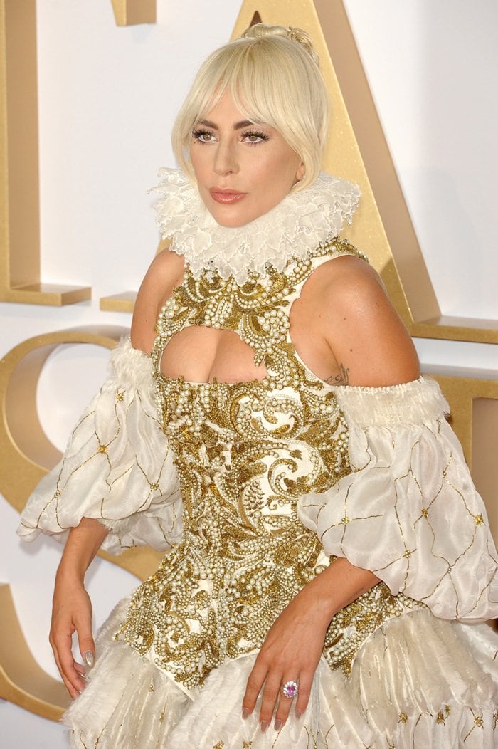 Lady Gaga's dress features an Elizabethan-inspired gold embellished corset-style bodice
