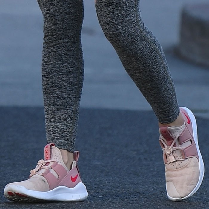 Lucy Hale wearing Nike Free RN Commuter running shoes