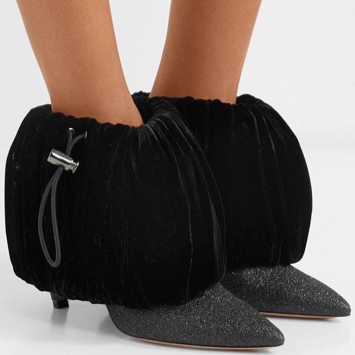 Crafted from luxury black Italian leather, they feature a pointed toe, a slip-on style, glitter details, a high stiletto, and are finished with a puffed style cotton overlay around the ankle with a drawstring fastening for a modern edge