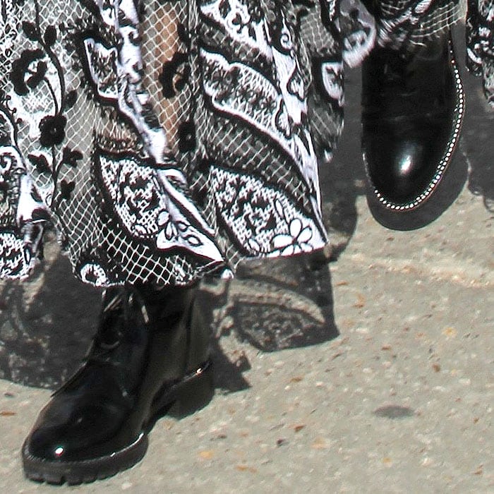 Details of the popular Christian Dior 'Rebelle' boots on Olivia Palermo.