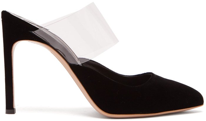 They're crafted from velvet with pointed toes and a clear Plexi arch strap that lends an of-the-moment touch to the otherwise classic style