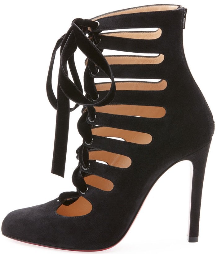 This vintage-inspired 100mm stiletto ankle boot features delicate matching velvet ribbon laces that droop over dramatic cutouts all along the vamp in a seductive game of shadows