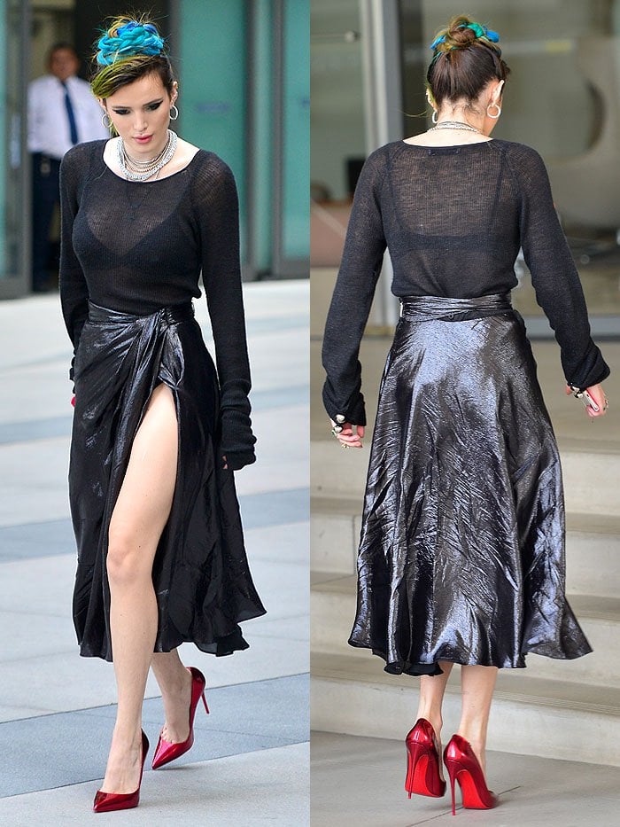 Bella Thorne in a sheer black top, a shiny black skirt, and red pumps at Culver City, CA