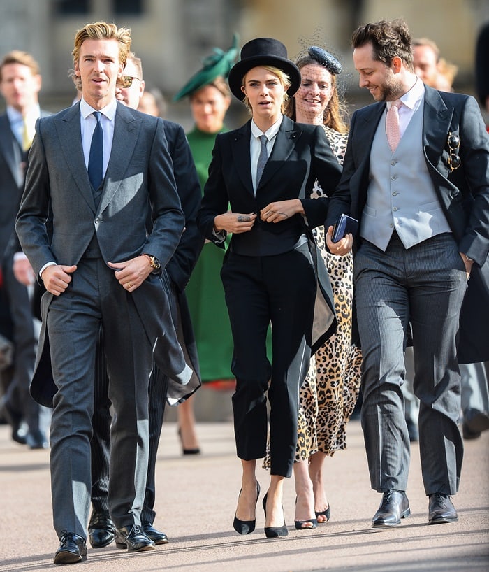 Cara Delevingne wore black Casadei Blade pumps with her tuxedo