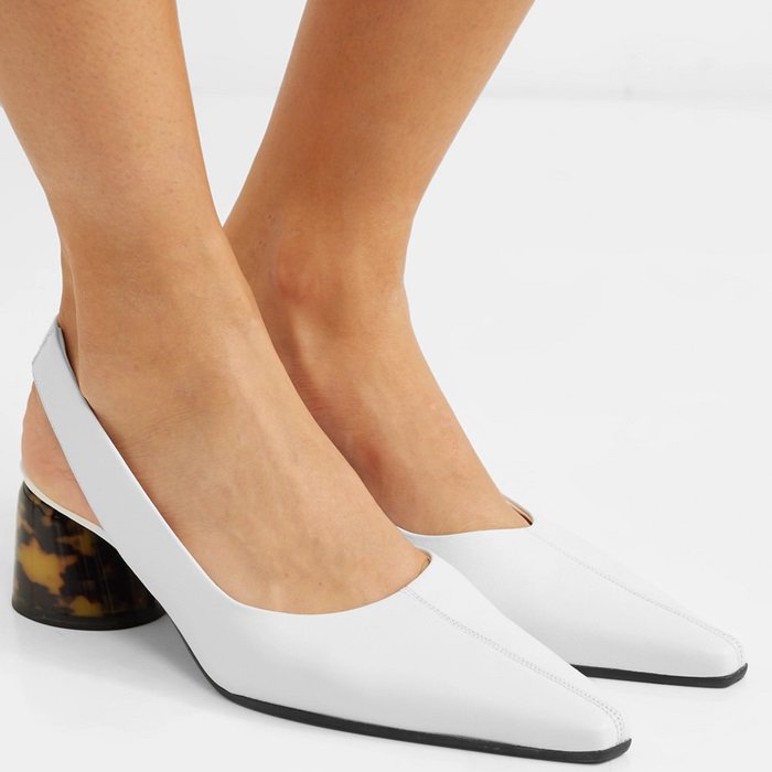 These practical pumps have been made in Italy from supple white leather and secure with an elasticated slingback strap
