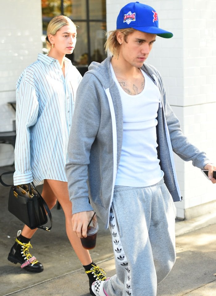 Justin Bieber and Hailey Baldwin grab breakfast at Joan’s on Third in Studio City on October 4, 2018, with Hailey grounding her oversized Acne Studios shirt in chunky House of Holland × Grenson hiking boots