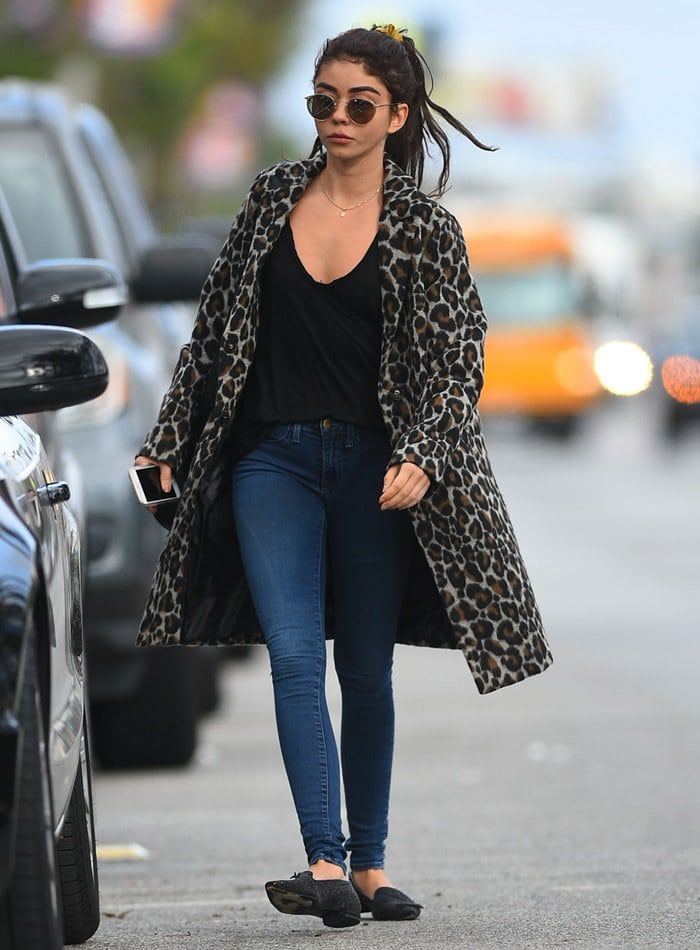 Sarah Hyland steps out in Studio City wearing a cheetah-print coat and Chiara Ferragni winking-eye flats while heading to Shape House