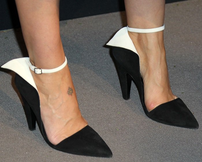 Sarah Paulson in black and white suede contrast ankle strap pumps