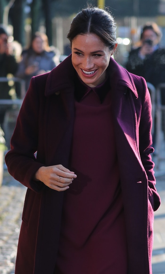 Meghan Markle's burgundy wool, double-breasted Daylina coat from Club Monaco