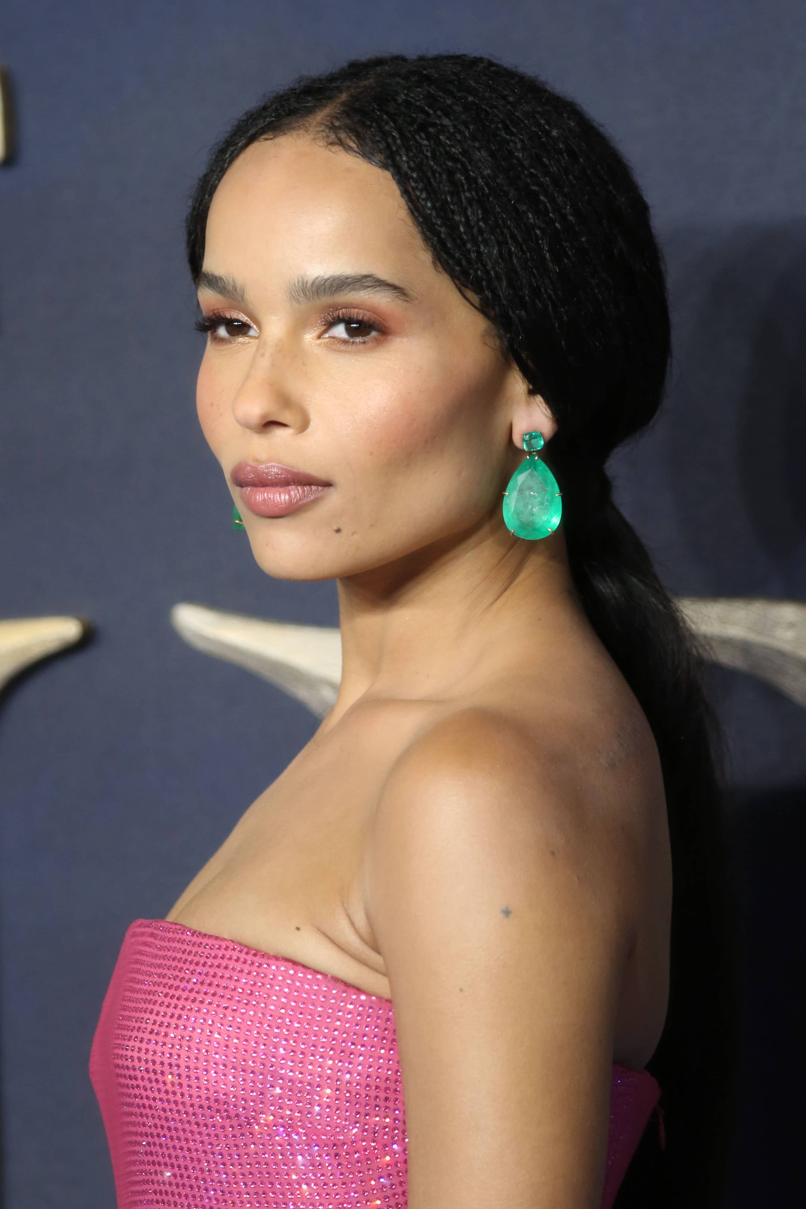 Zoë Kravitz wearing exquisite emerald drop earrings at the "Fantastic Beasts: The Crimes Of Grindelwald" UK premiere held at Cineworld Leicester Square in London, England, on November 13, 2018