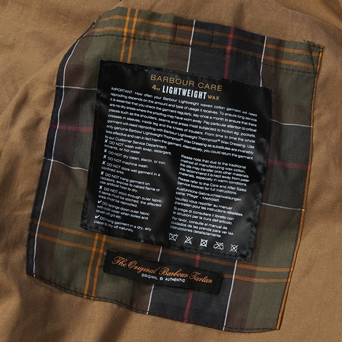 Barbour jackets come with detailed waxing care instructions printed on the inner tartan lining—essential for maintaining the jacket’s waterproof protection and longevity