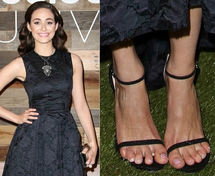 Emmy Rossum showcases her feet in black strappy heels, revealing her so-called "peanut toes," as she attends an event in a chic black lace dress