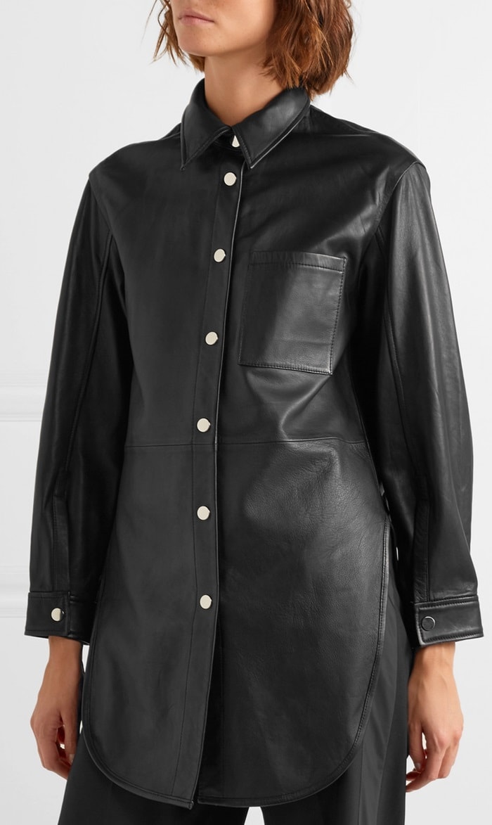 This longline piece is simply detailed with deep slits at each side and a chest patch pocket.