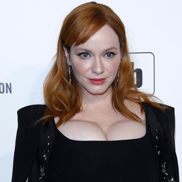 Christina Hendricks exudes elegance in a bold black dress with structured shoulders