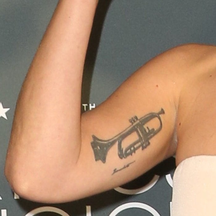 Lady Gaga's trumpet arm tattoo in honor of jazz musician Tony Bennett