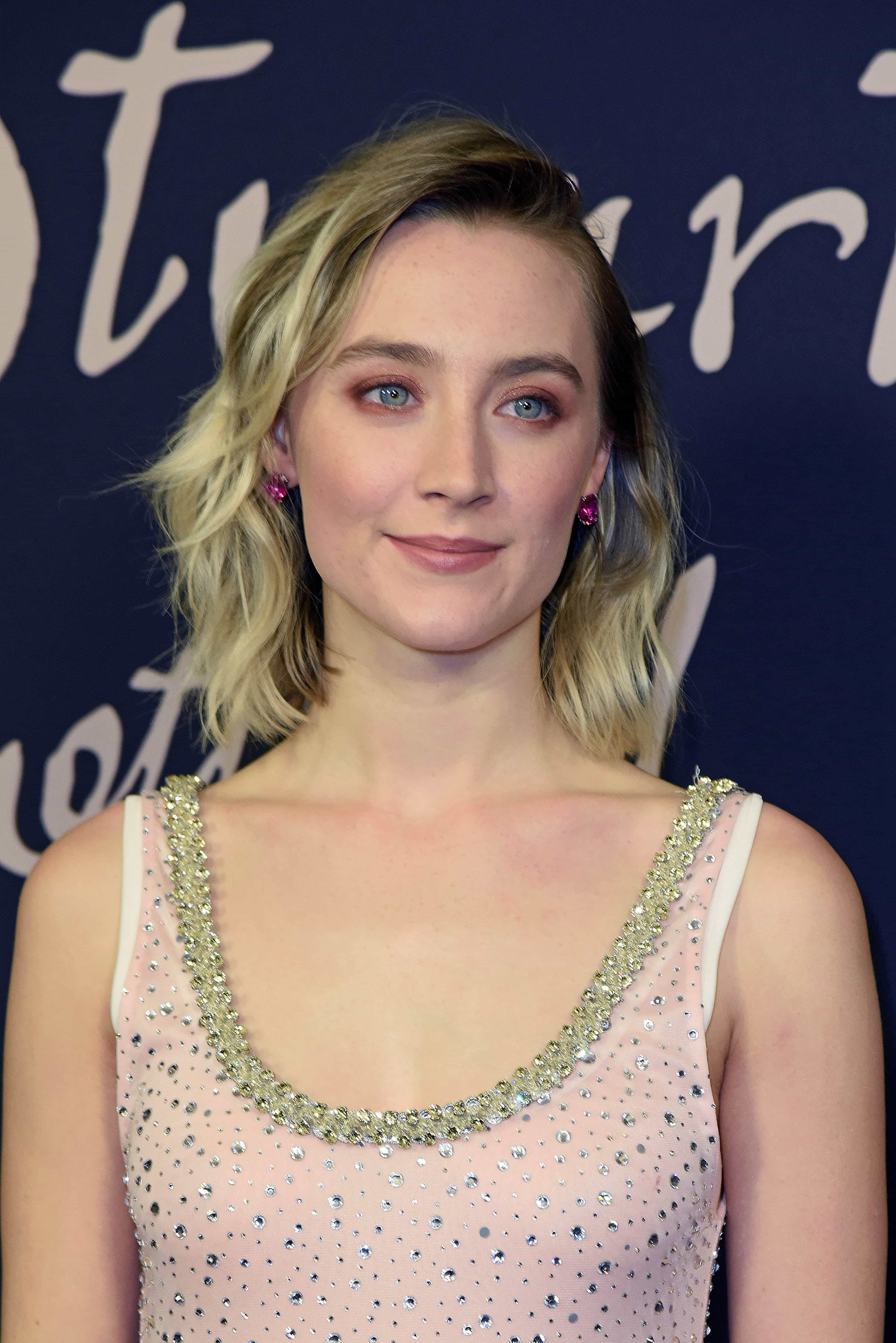 Saoirse Ronan wearing Anabela Chan pink-stone earrings with a Miu Miu crystal-embellished scoop-neck dress