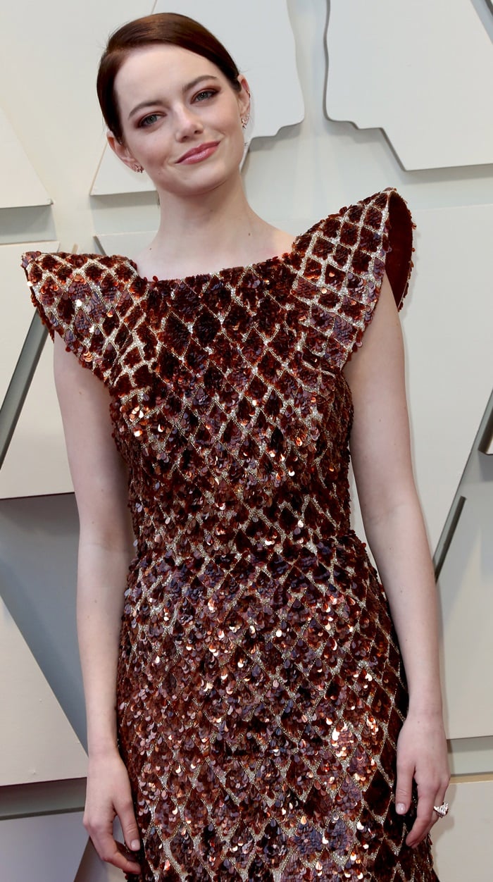 Emma Stone’s beehive-inspired Louis Vuitton gown—fondly compared by fans to everything from toast to bacon to waffles—became one of the most delightfully divisive looks of the 2019 Oscars