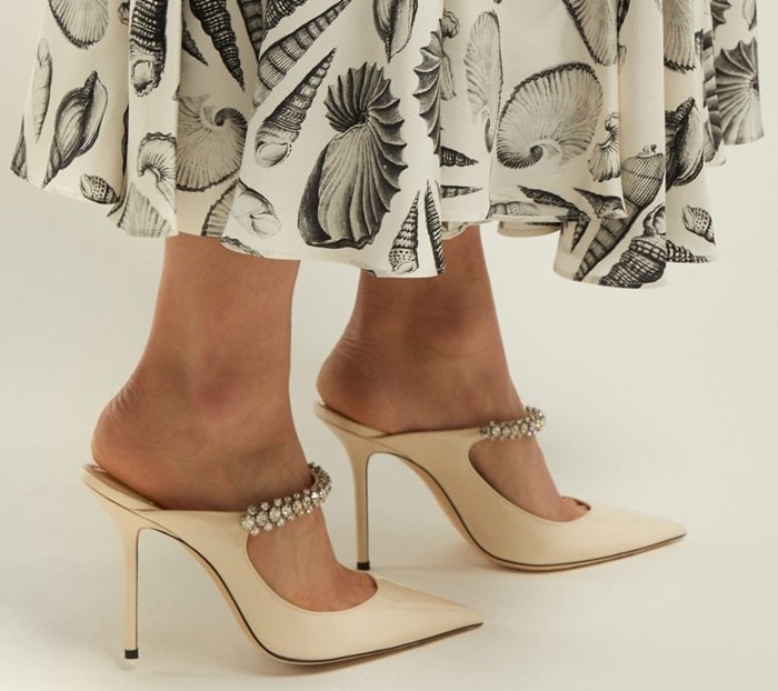 They're detailed with a crystal-embellished strap that catches the light as you move, making them perfect for your next party