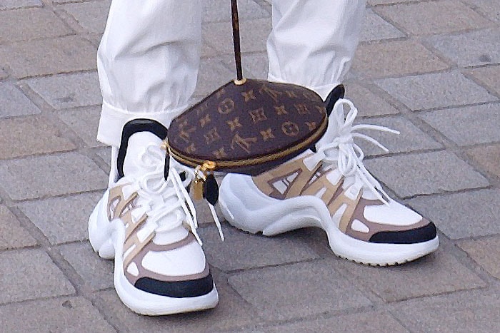 Details of Jaden Smith's Louis Vuitton 'Toupie' bag and dad sneakers, the Louis Vuitton 'Archlight' from the women's line