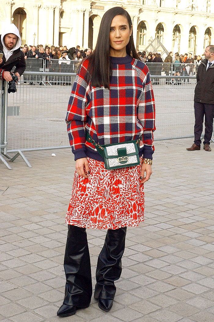 Jennifer Connelly wearing a bizarre layered Louis Vuitton outfit for the Louis Vuitton Fall 2019 fashion show