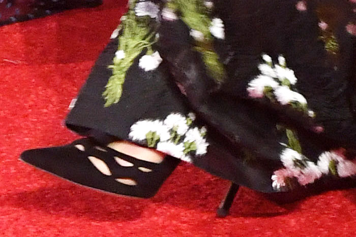 Kate Middleton taking a step in her Prada cutout suede pumps