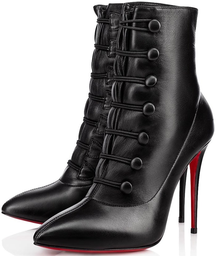 Black Christian Louboutin “French Tutu” leather ankle boots featuring vintage-inspired button-front detailing, pointed toes, slim stiletto heels, and the house’s signature red lacquered soles